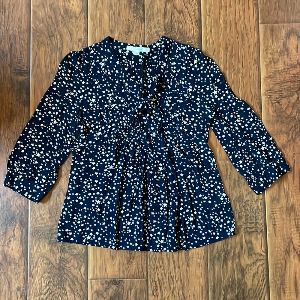 Boden navy blouse with white stars with multiple cute details.